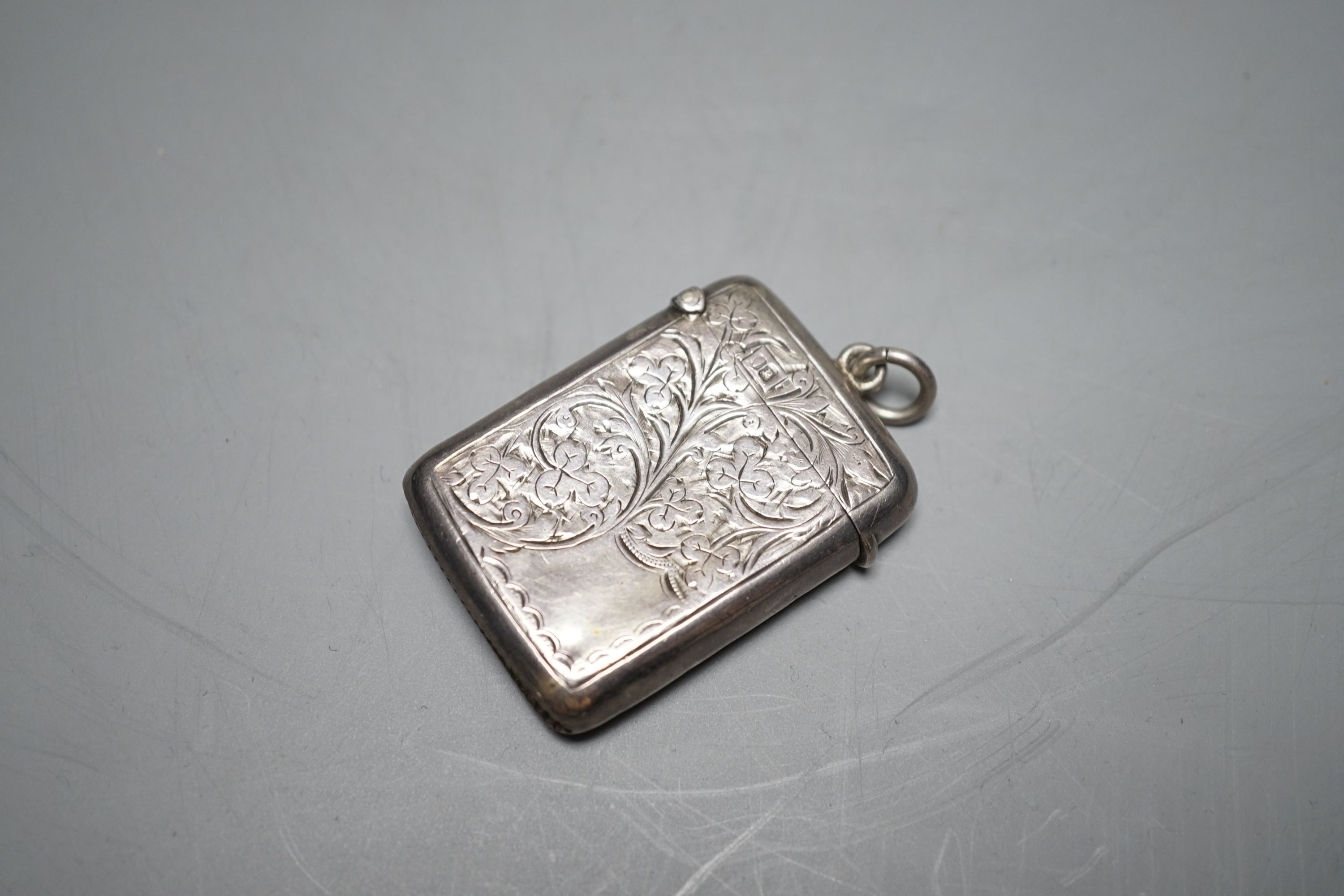A George III Irish silver meat skewer, Richard Sawyer, Dublin, 1806, 19.4cm and a George V Irish silver vesta case.